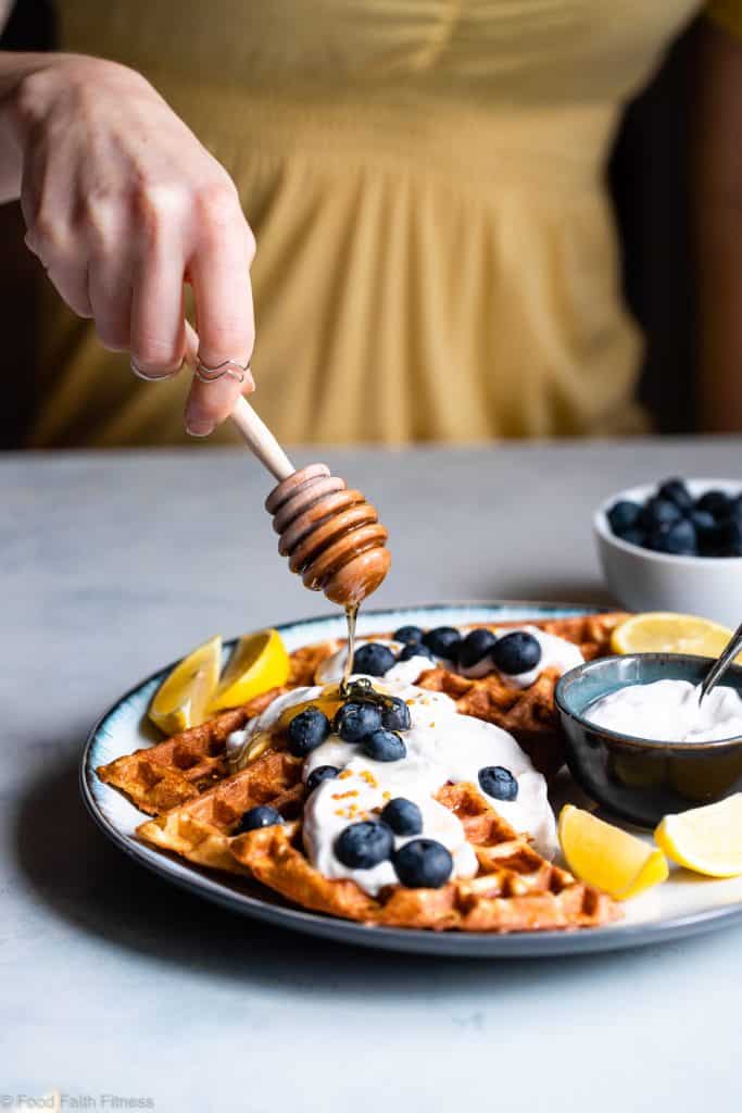 Lemon Blueberry Gluten Free Greek Yogurt Waffles - These gluten free waffles are so crispy and fluffy you will never believe they're low fat, oil free, protein packed and only 170 calories! | #Foodfaithfitness | #Glutenfree #Lowfat #Healthy #Waffles #Breakfast