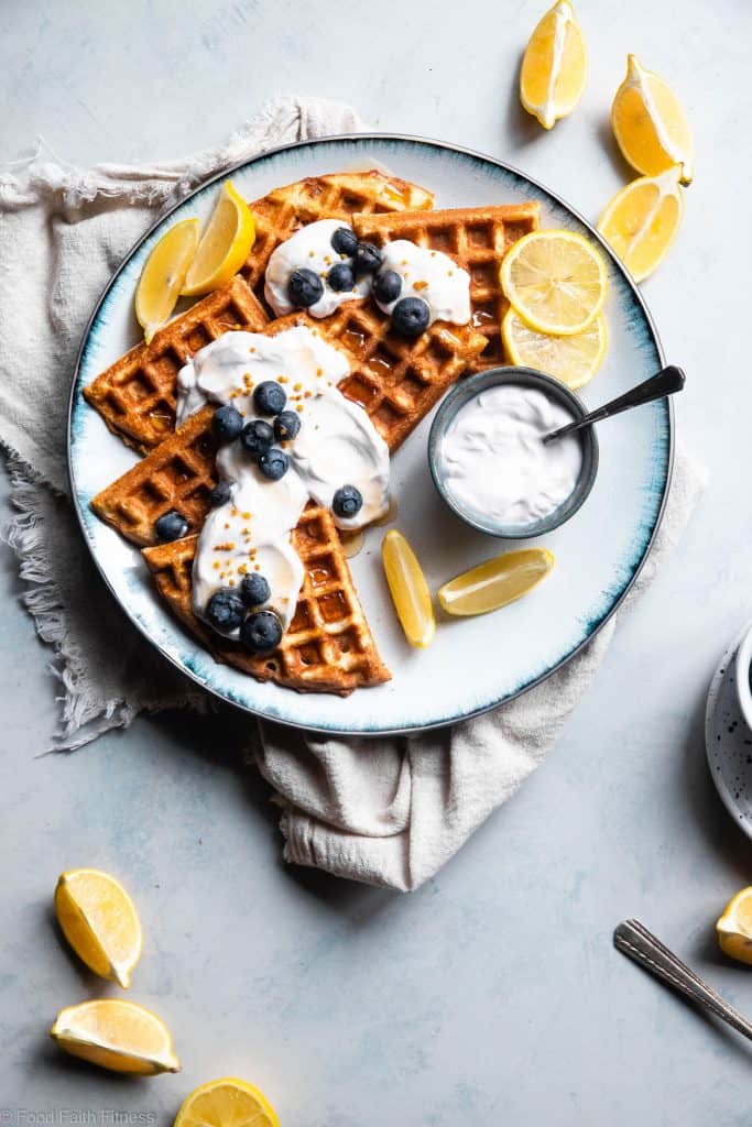 Lemon Blueberry Gluten Free Greek Yogurt Waffles - These gluten free waffles are so crispy and fluffy you will never believe they're low fat, oil free, protein packed and only 170 calories! | #Foodfaithfitness | #Glutenfree #Lowfat #Healthy #Waffles #Breakfast