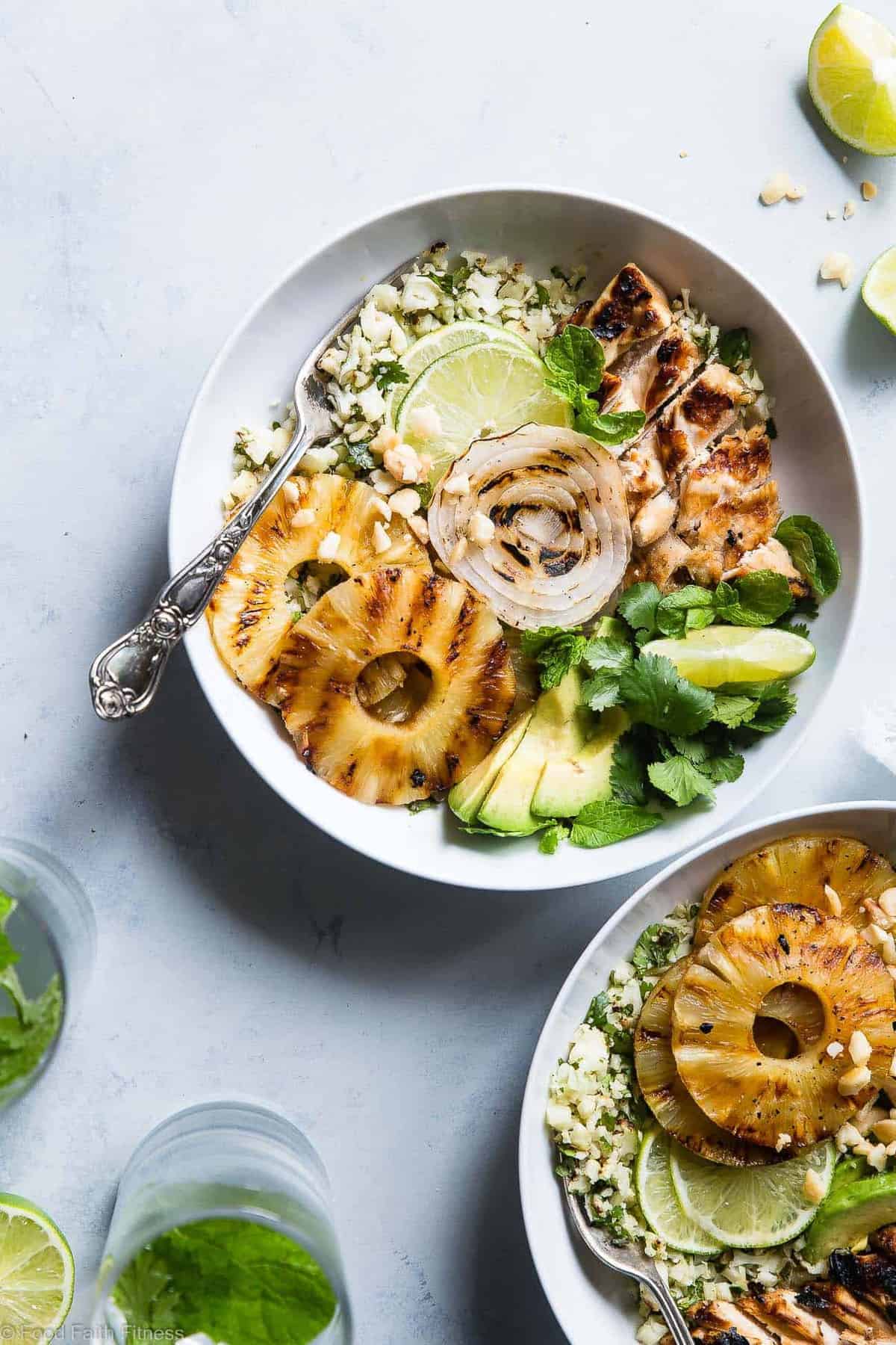 Grilled Tropical Chicken Bowls - These paleo and whole30 compliant Grilled Tropical Chicken bowls are an easy, healthy and gluten free weeknight dinner loaded with sweet and tangy island flavors! Sure to be a crowd pleaser! | #Foodfaithfitness | #Paleo #Whole30 #Glutenfree #Healthy #Chickendinner