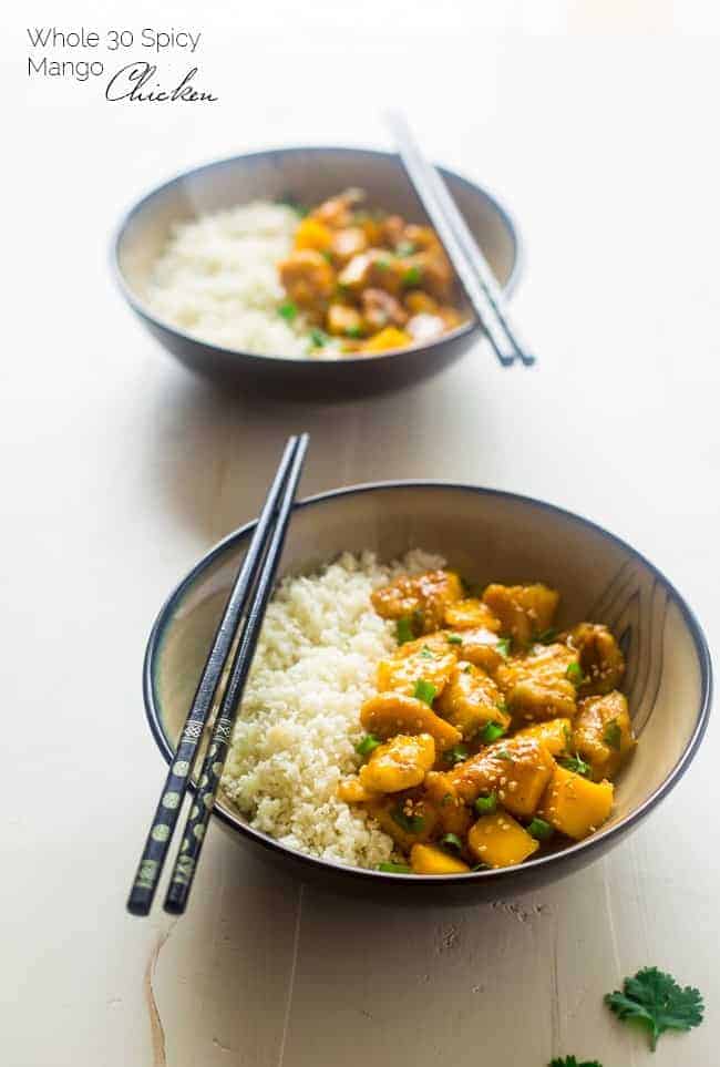 Mango Chicken with Coconut Cauliflower Rice - This paleo mango chicken is served over coconut cauliflower rice for a quick, easy and healthy spin on take-out that is ready in 30 mins! Recipe has a vegan option too! | Foodfaithfitness.com | @FoodFaithFit